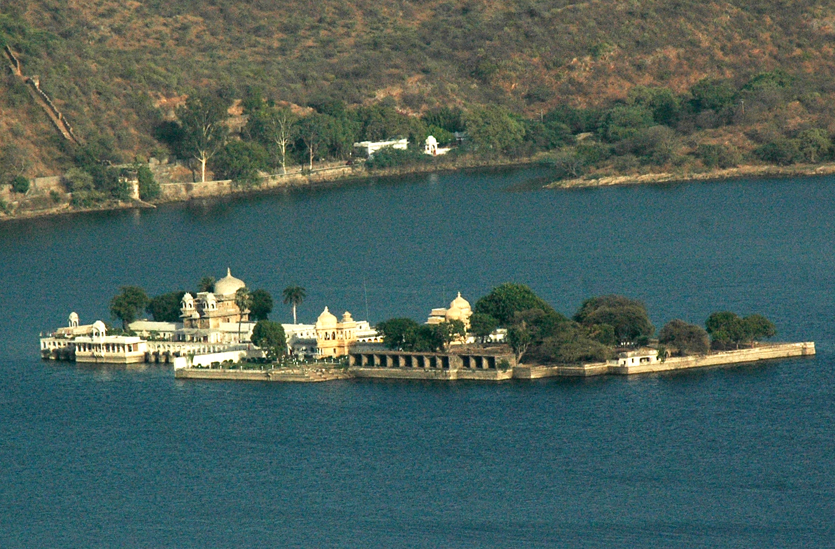 It is a palace located on an island in Lake Pichola